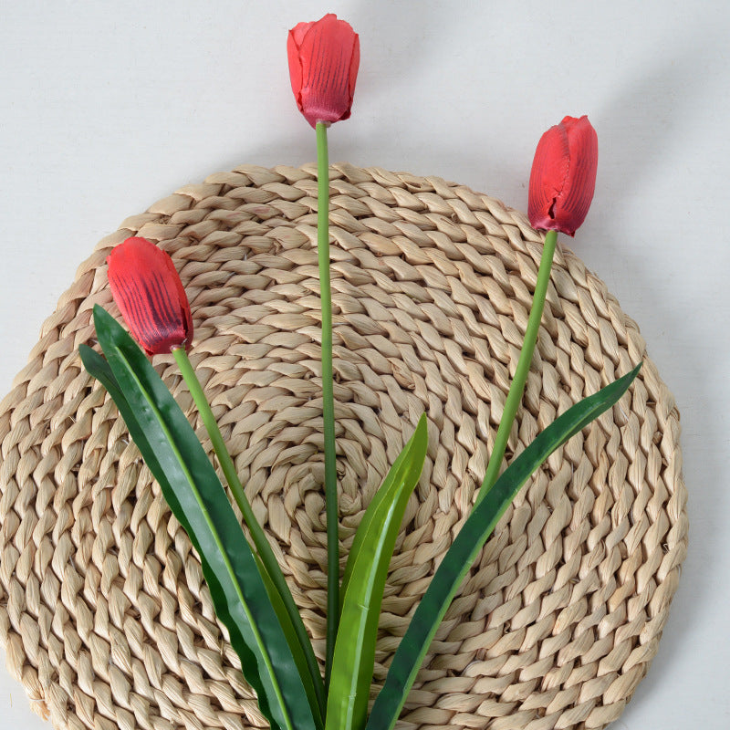 Dekorative Kunsttulpenstielarrangement