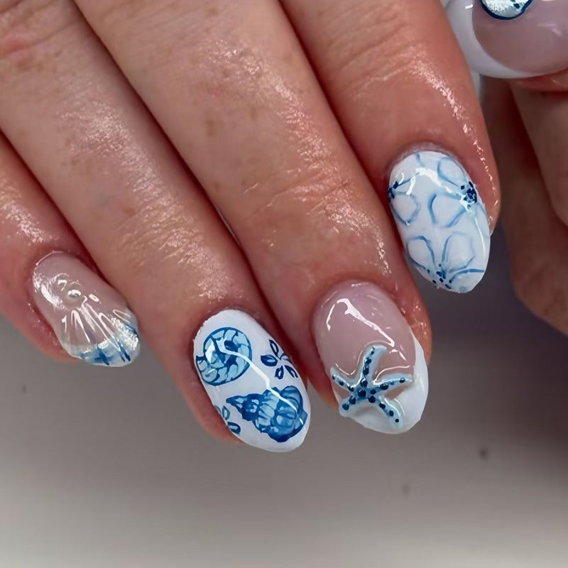 Kunstnagelset mit maritimem Design und kreativen Details Brehn
