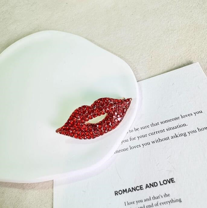 Glitzernde Lippenbrosche Brehn