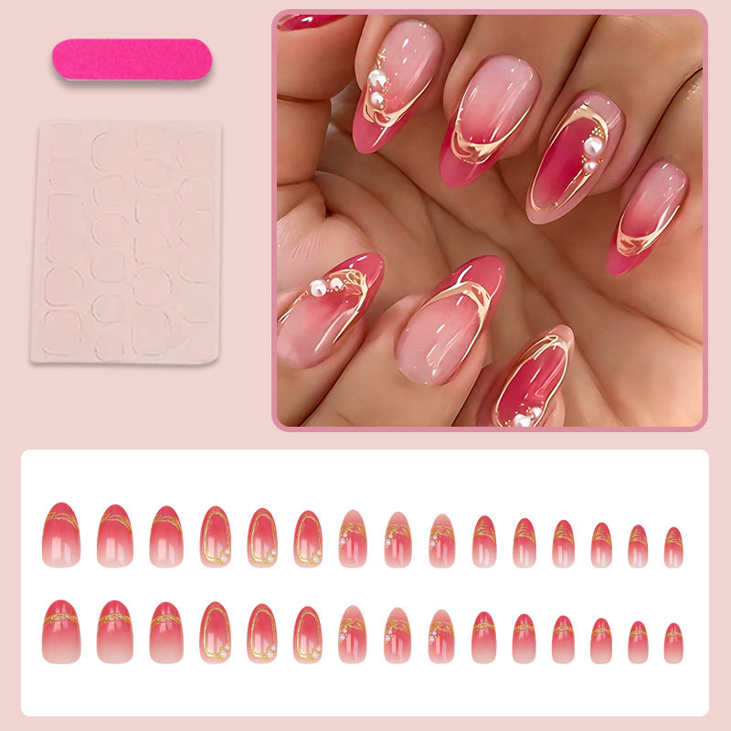 Kunstnagelset mit eleganten Ombré-Designs und Glitzerakzenten Brehn