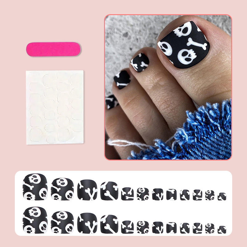 Fußnagel Kunstset mit kreativen Totenkopf- und Knochenmotiven Brehn