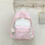 Niedlicher gestreifter Schulrucksack