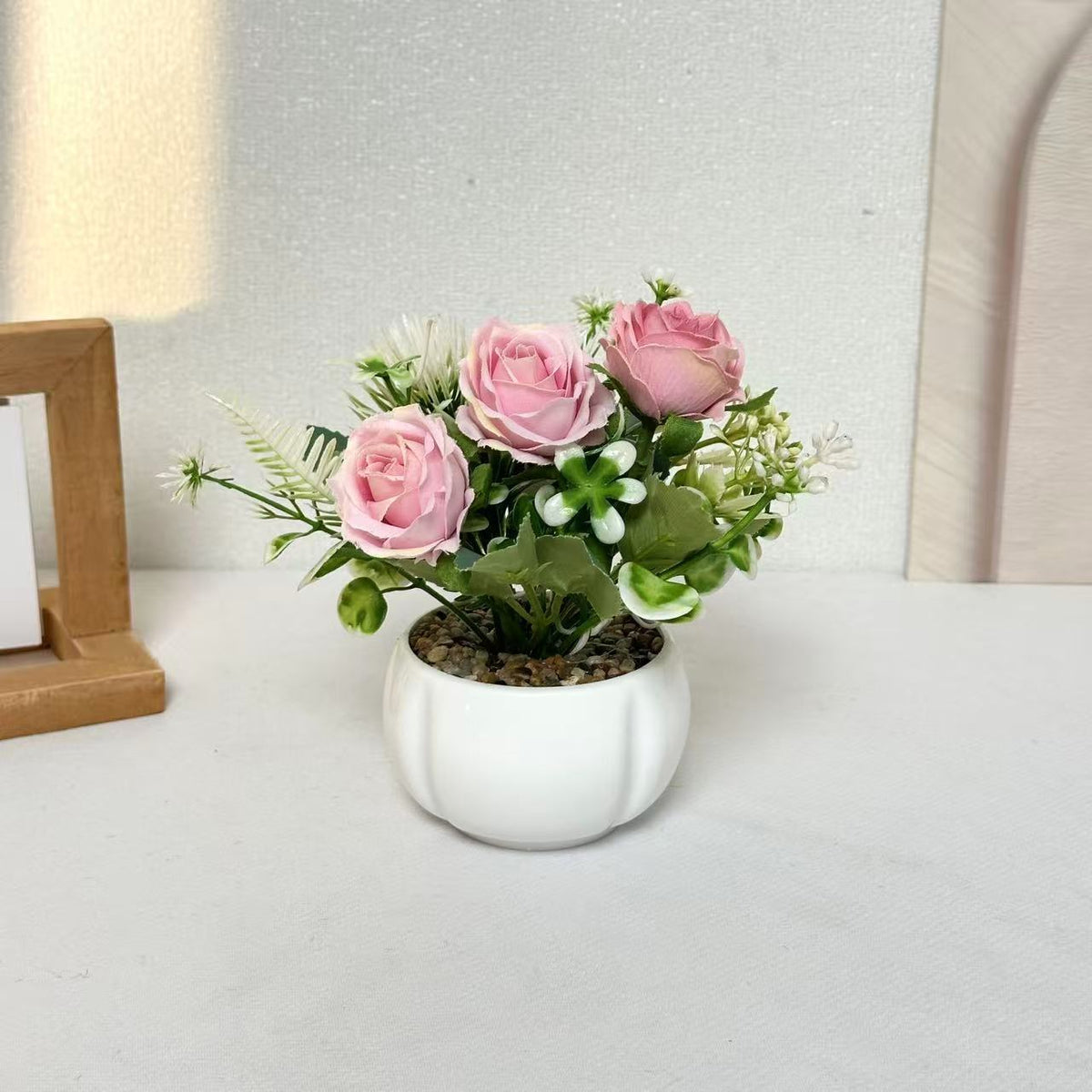 Dekorative Miniatur Blumenarrangement