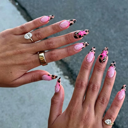Kunstnagelset mit glamourösen Leoparden-Design und Glitzerelementen Brehn