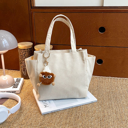 Texturierte Cordura-Tote-Tasche mit niedlichem Plüsch-Anhänger