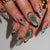 Dekorative Stiletto Nagelkunst Tipps mit floralen Akzenten Brehn