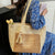 Handgefertigte Strohtasche mit Quasten Brehn