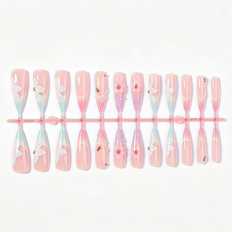 Kunstnagelset mit eleganten Blüten- und zarten Farbverläufen Brehn