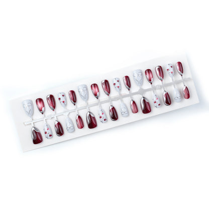 Elegantes Künstlerisches Press-On Nagelset mit Glänzendem Finish und Floralen Akzenten Brehn