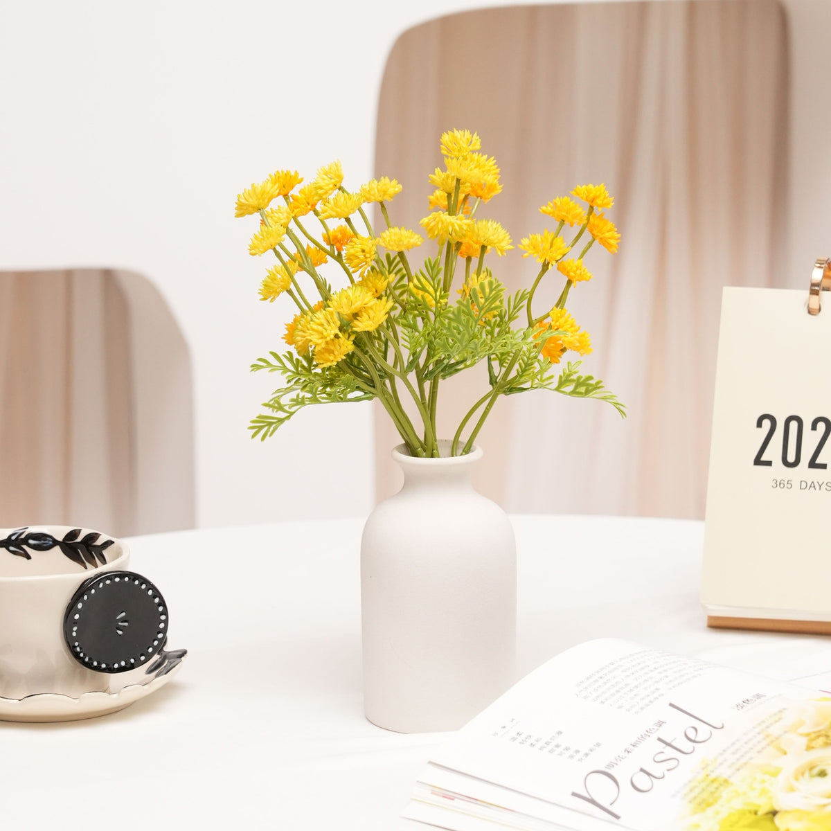 Lebensechte Blumenzweiganordnung