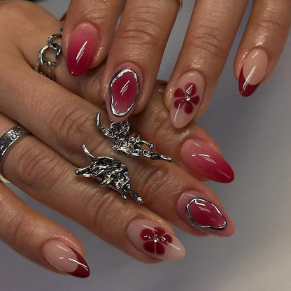 Kunstnagelset mit eleganten Blüten- und Ombre-Akzenten Brehn