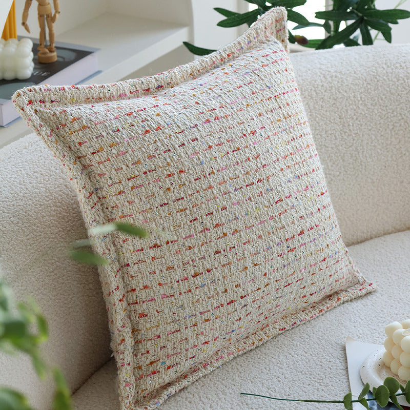 Quadratischer Bouclé-Kissenbezug im Tweedstil mit dezentem Multicolor‑Tufting Brehn