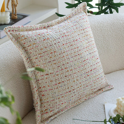 Quadratischer Bouclé-Kissenbezug im Tweedstil mit dezentem Multicolor‑Tufting Brehn