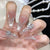 Glamouröse Kunstnagelspitzen mit Strass-Akzenten Brehn