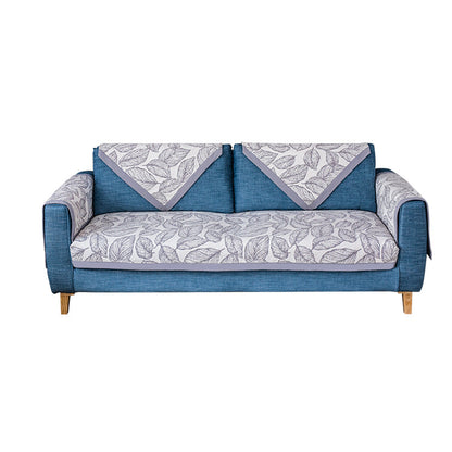Universelle Sofa-Schutzauflage für Dreisitzer mit Blätter-Print, rutschfester Unterseite und separaten Armlehnenbezügen Brehn