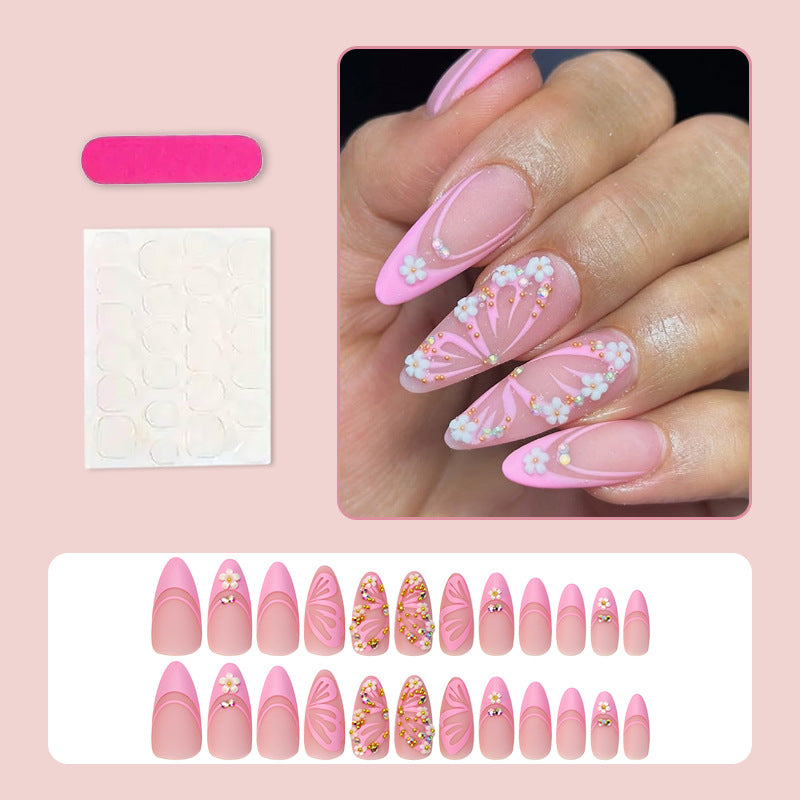 Kunstnagelset mit eleganten blauen und nude Farbakzenten Brehn