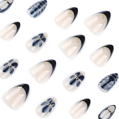Kunstvolle Nailart im eleganten Stiletto-Design mit floralen Akzenten Brehn