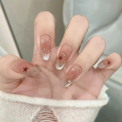 Elegantes Press-On-Nageldesign mit Strassakzenten Brehn