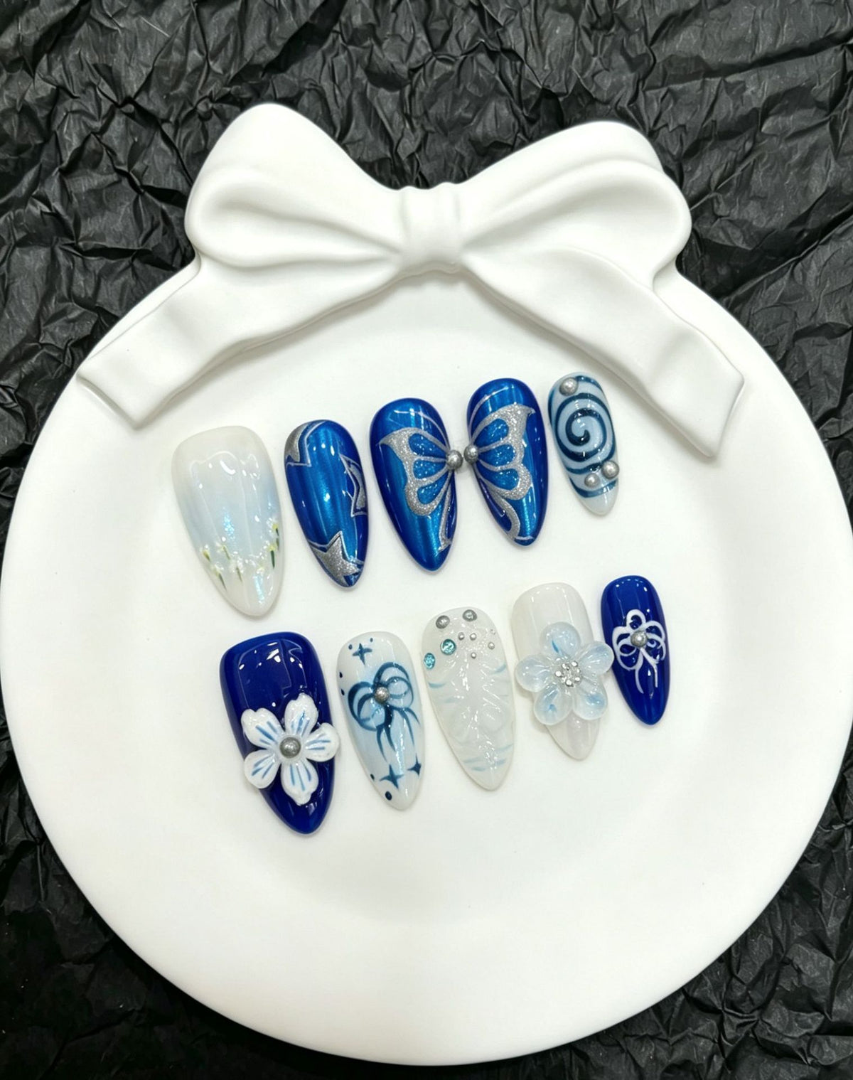 Dekorative Schmetterlings Press-On Nagelkunst Kollektion