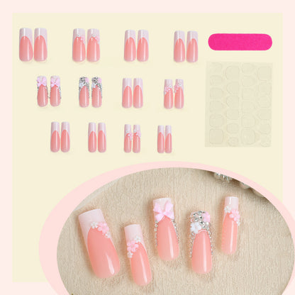 Dekorativer Press-On Nagelset mit eleganten floralen und Juwelenelementen Brehn