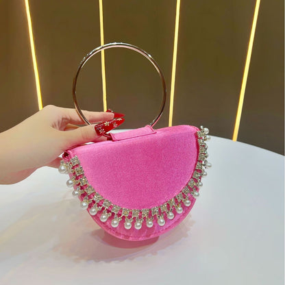 Perlenakzentierte Abend-Clutch