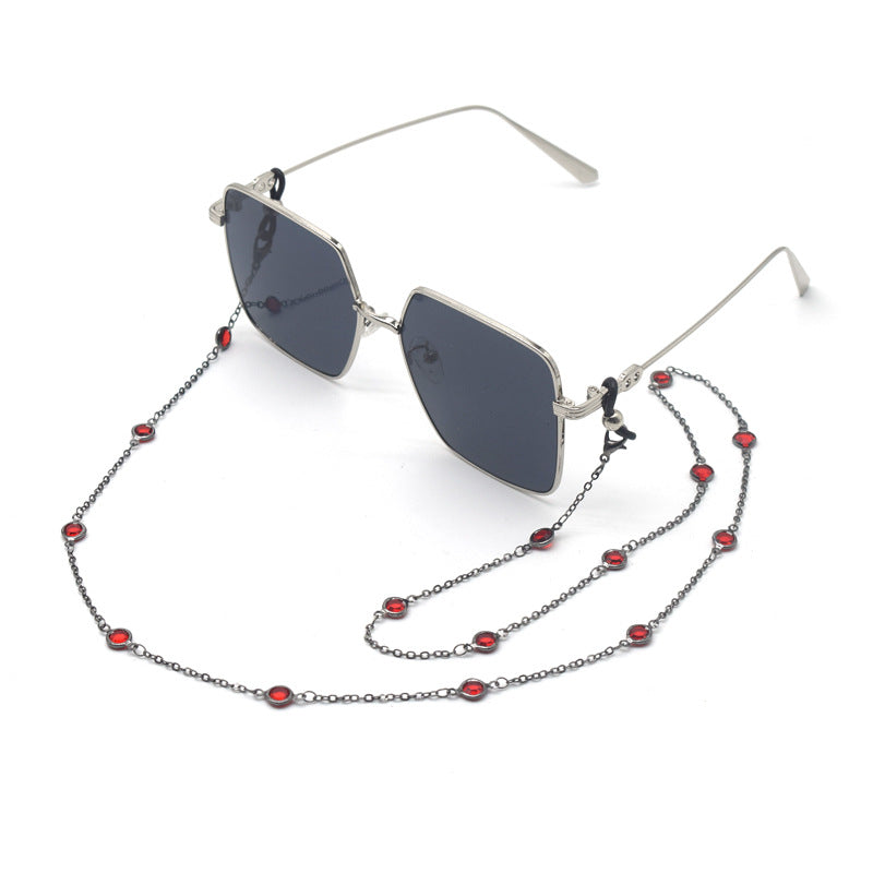 Stylische quadratische Sonnenbrille mit dekorativer Kette Brehn