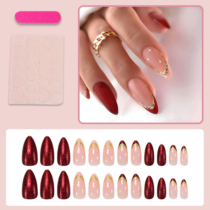 Kunstnagelset mit luxuriösen Glitzerverzierungen und starren Spitzen Brehn