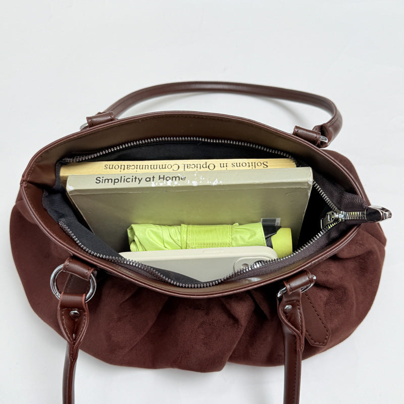 Geraffte Wildleder-Handtasche