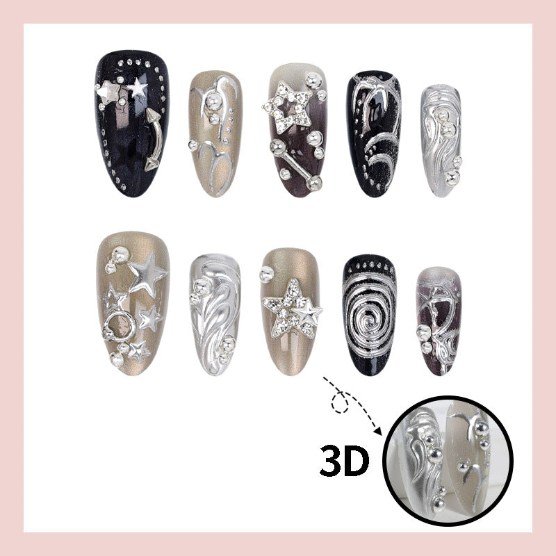 Kunstnageldesign Set mit glamourösen Sternen- und Metallic-Akzenten Brehn