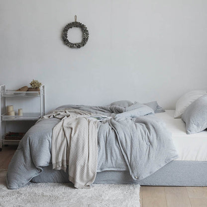 Kuschel-Steppbett mit Punkt-Tufting und wendbarem Microfaserbezug