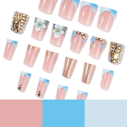 Kunstvolle Nagelverlängerungen mit Floral-Design und Glitzer Brehn