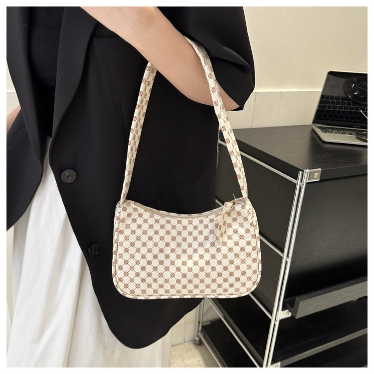 Stylische karierte Schultertasche