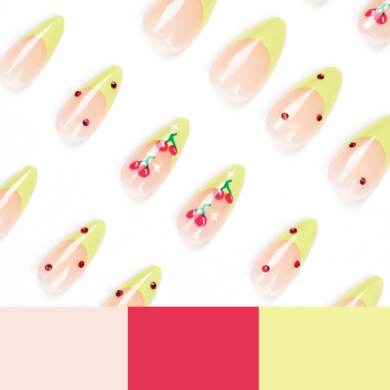 Kunstvolle Press-On Nägel mit fruchtigem Design Brehn