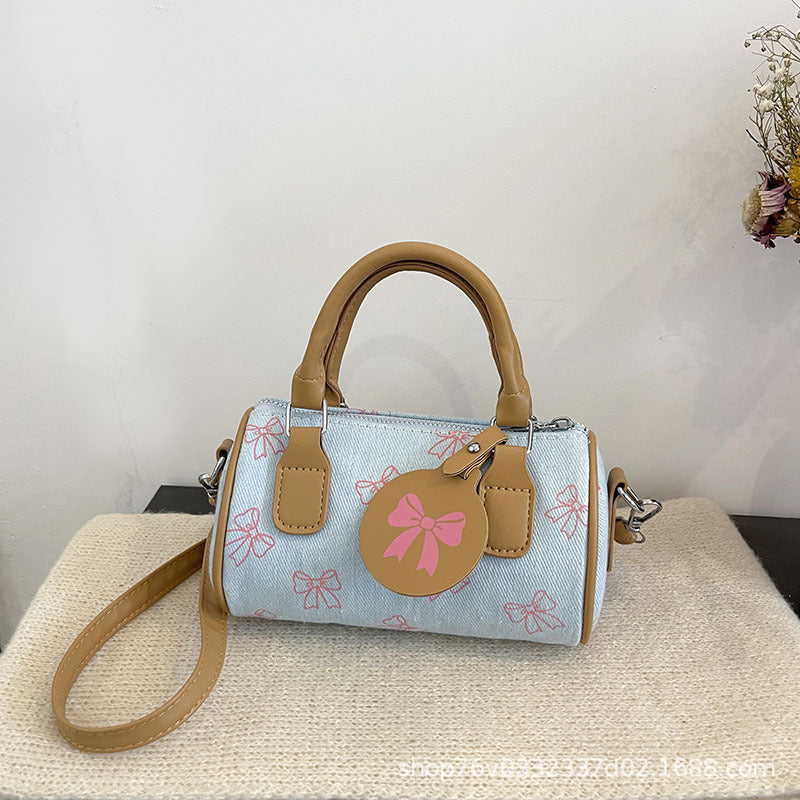 WoPlayful Bow-Printed Mini-Handtasche Brehn