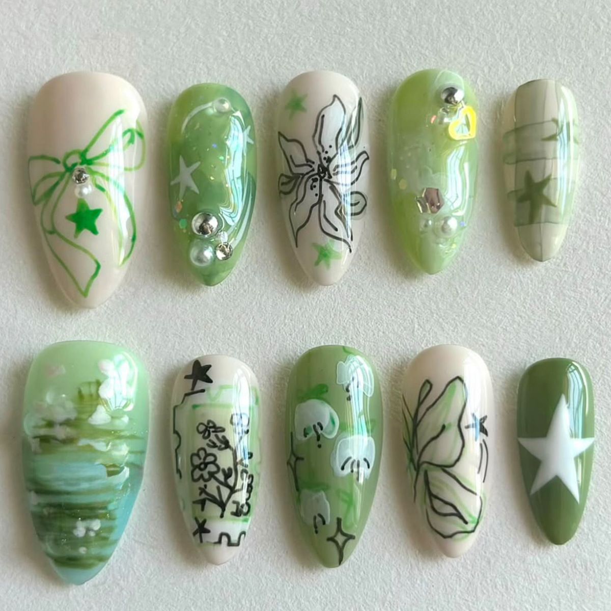Künstlerische grüne Nagelverbesserungen Brehn