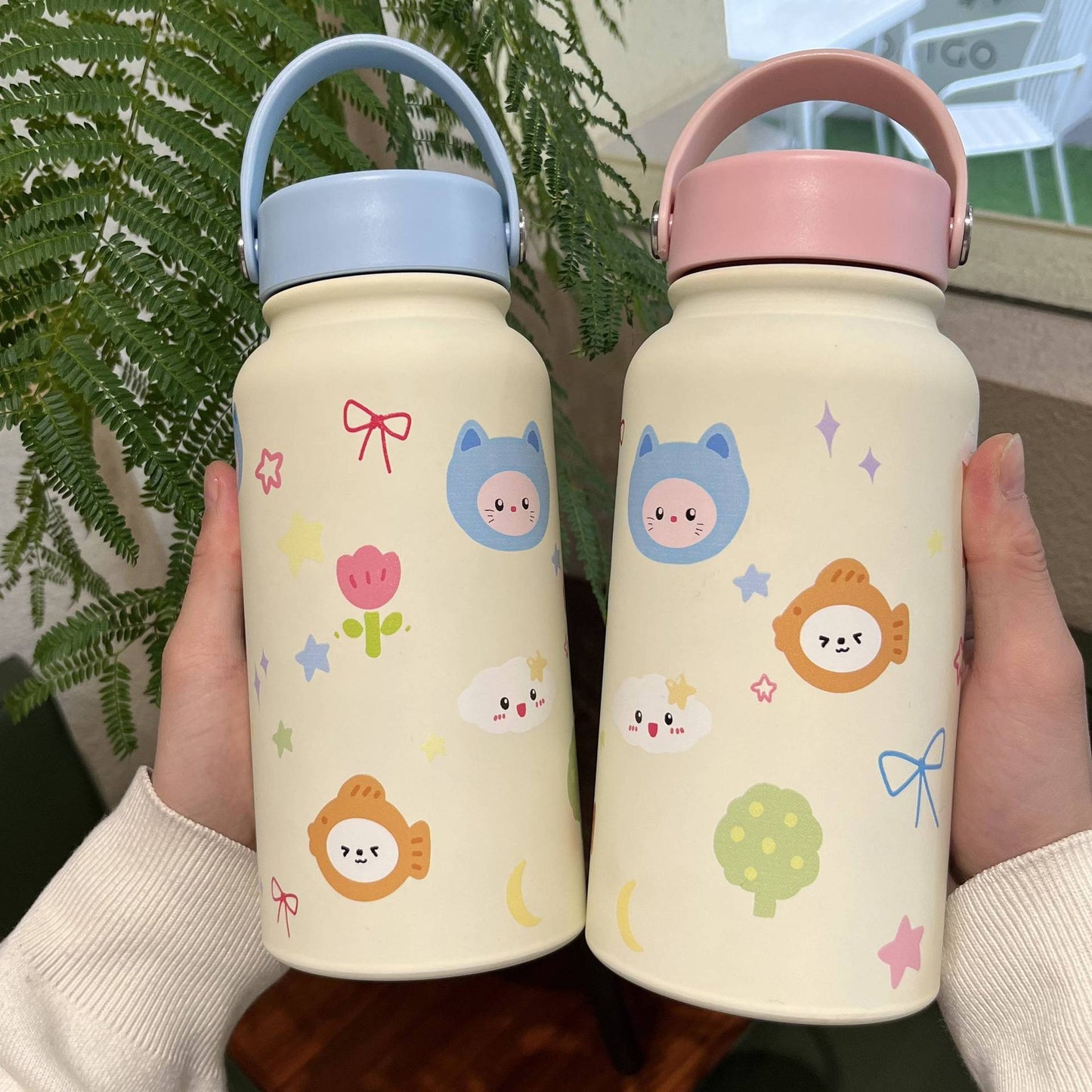 Damen Isolierflasche mit praktischer Tragelasche und verspieltem Design Brehn