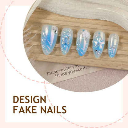 Künstliche Nagel-Kreation mit floralen Designs und Glitzerakzenten Brehn
