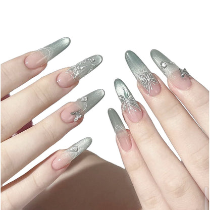 Dekoratives Stiletto Press-On Nagelset mit künstlerischen Blumen- und Edelsteinakzenten Brehn