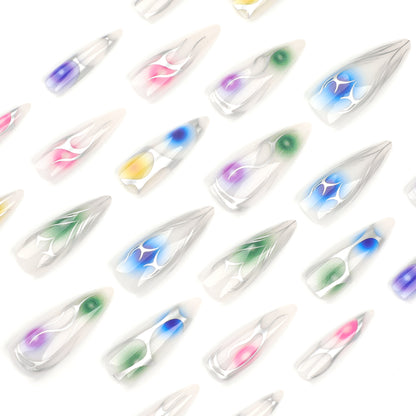 Kunstvolle Stiletto-Nägel mit transparentem Design und farbenfrohen Akzenten Brehn