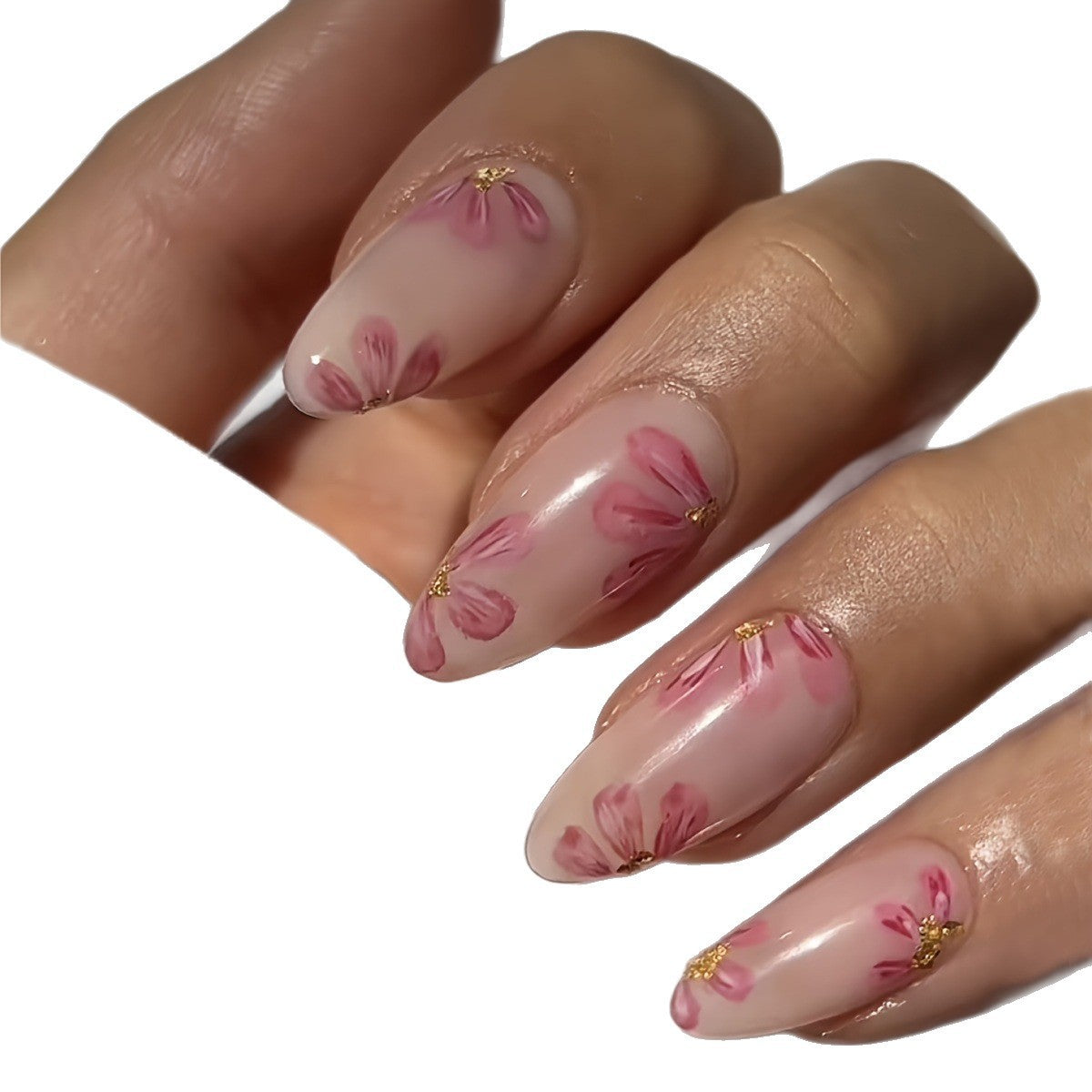 Kunstnagelset mit floralen Akzenten und Goldverzierungen Brehn