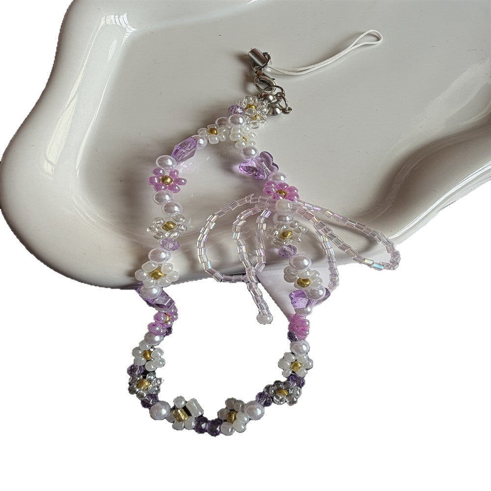 Blumiger Perlenbrillenhalter Brehn