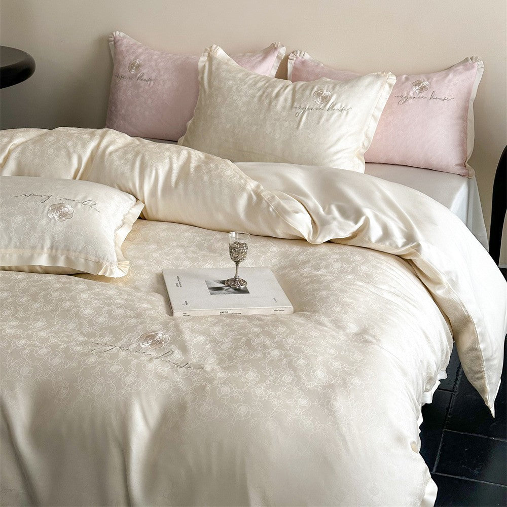 Luxuriöse Baumwollsatin-Bettwäschegarnitur mit Jacquard‑Relief und gesticktem Rosenmotiv