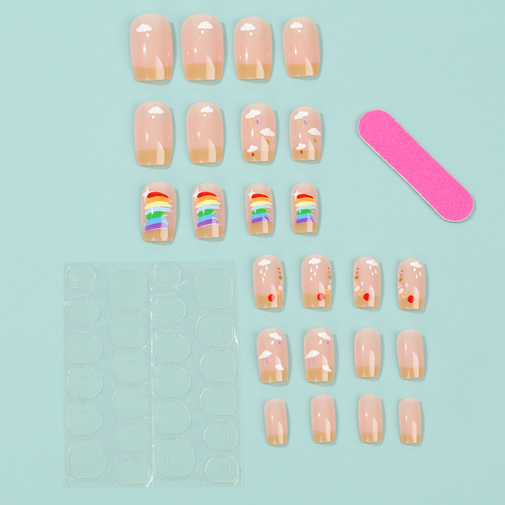 Kreatives Kunstnägel Set mit Regenbogen- und Wolkenmotiven Brehn