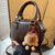 Schlanke strukturierte Mini-Schultertasche Brehn