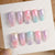Kunstnagelset mit floralen Akzenten und zartem Glitzereffekt Brehn