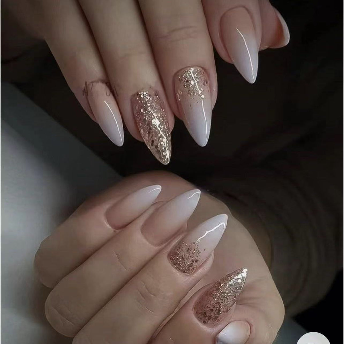 Elegante Kunstnägel mit Glitzerakzenten und modernen Designs Brehn