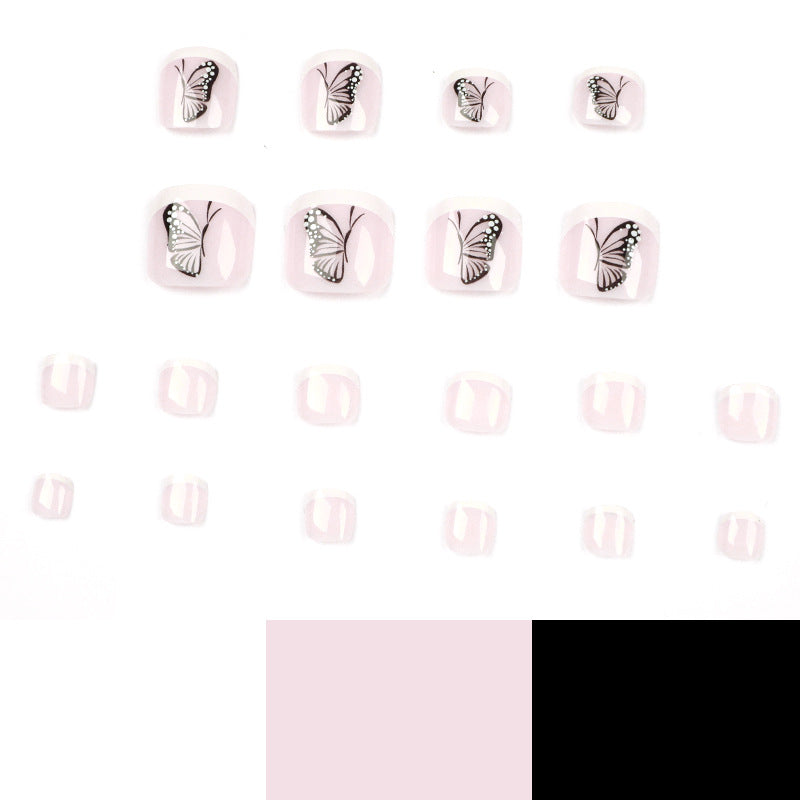 Kunstvolle Fußnagelkunst mit Schmetterlingsdesign Brehn