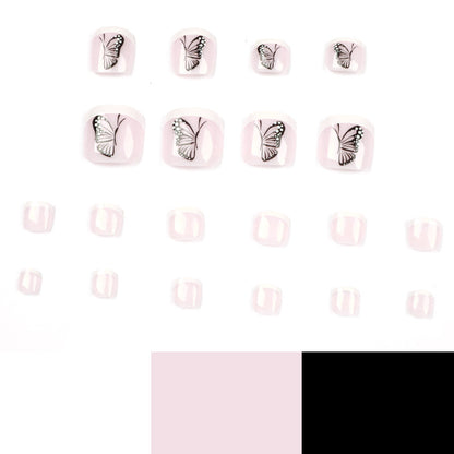 Kunstvolle Fußnagelkunst mit Schmetterlingsdesign Brehn