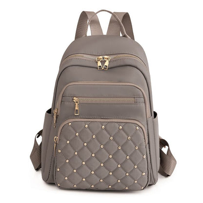 Quilted Rucksack mit dekorativen Nieten Brehn
