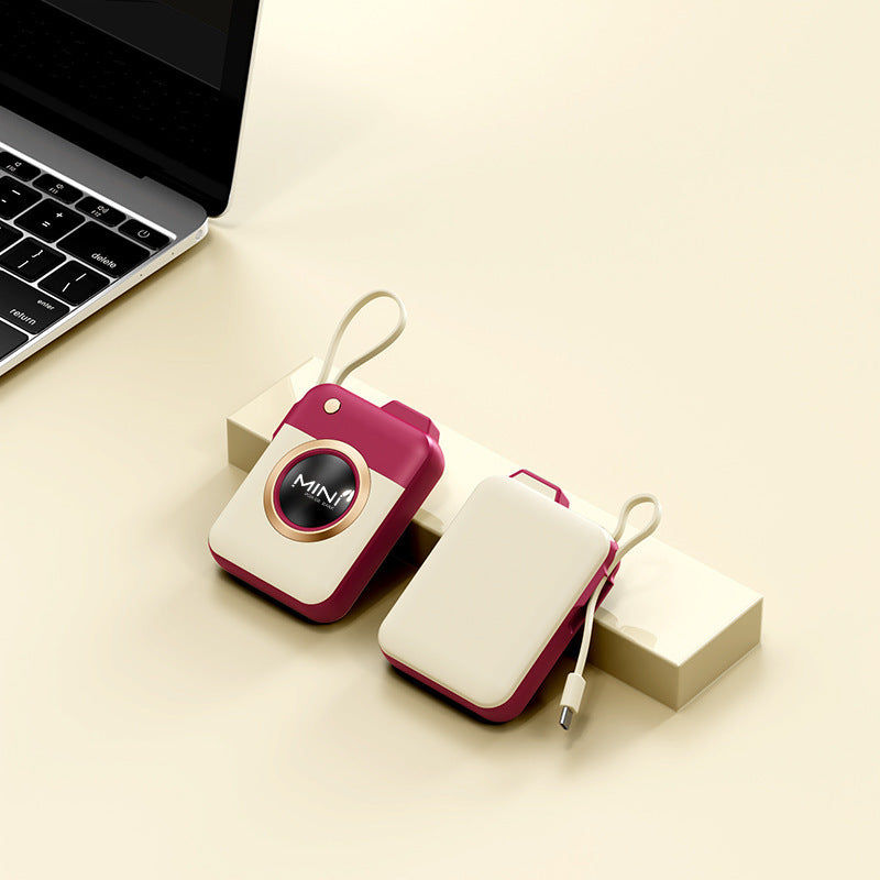 Tragbare Mini-Powerbank mit Integriertem Ladekabel und Innovativem Design Brehn